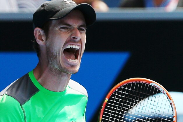 Andy Murray of Britain celebrates after beating Yuki Bhambri of India during their first round match at the Australian Open tennis championship in Melbourne, Australia, Monday, Jan. 19, 2015. (AP Photo/Rob Griffith)