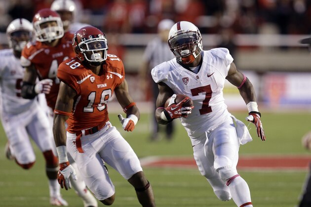 Stanford wide receiver Ty Montgomery (7) carries the ball as Utah defensive back Eric Rowe (18) pursues in the second half during an NCAA college football game Saturday, Oct. 12, 2013, in Salt Lake City. Utah won 27-21. (AP Photo/Rick Bowmer)