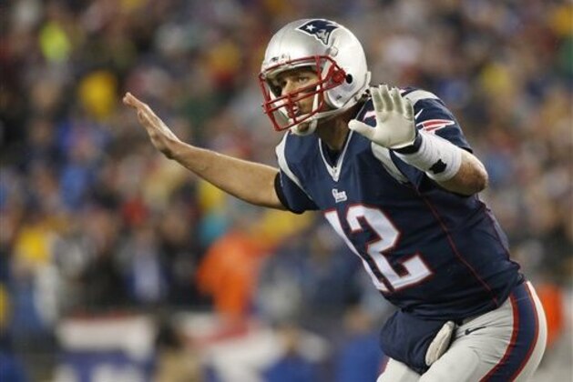 New England Patriots quarterback Tom Brady (12) calls a play during the first half of the NFL football AFC Championship game against the Indianapolis Colts Sunday, Jan. 18, 2015, in Foxborough, Mass. (AP Photo/Elise Amendola)