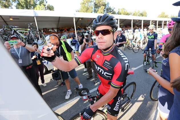 ADELAIDE, AUSTRALIA - JANUARY 18:  Cadel Evans of Australia and the BMC Racing team signs on before riding in the People's Choice Classic, a one day event prior to Stage 1 of the 2015 Santos Tour Down Under on January 18, 2015 in Adelaide, Australia.  (Photo by Morne de Klerk/Getty Images)