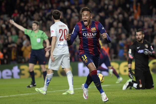 FC Barcelona's Neymar, from Brazil, centre, reacts after scoring against Atletico Madrid during a Spanish La Liga soccer match at the Camp Nou stadium in Barcelona, Spain, Sunday, Jan. 11, 2015. (AP Photo/Manu Fernandez) FC Barcelona's Neymar, from Brazil, centre, reacts after scoring against Atletico Madrid during a Spanish La Liga soccer match at the Camp Nou stadium in Barcelona, Spain, Sunday, Jan. 11, 2015. (AP Photo/Manu Fernandez)