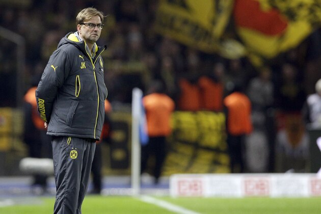 Dortmund's head coach Juergen Klopp attends the German Bundesliga soccer match between Hertha BSC Berlin and Borussia Dortmund at the Olympia stadium in Berlin, Germany, Saturday, Dec. 13, 2014. (AP Photo/Michael Sohn)