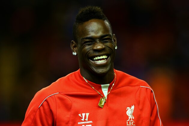 LIVERPOOL, ENGLAND - DECEMBER 29:  Mario Balotelli of Liverpool laughs during the warm-up for the Barclays Premier League match between Liverpool and Swansea City at Anfield on December 29, 2014 in Liverpool, England.  (Photo by Clive Brunskill/Getty Images)