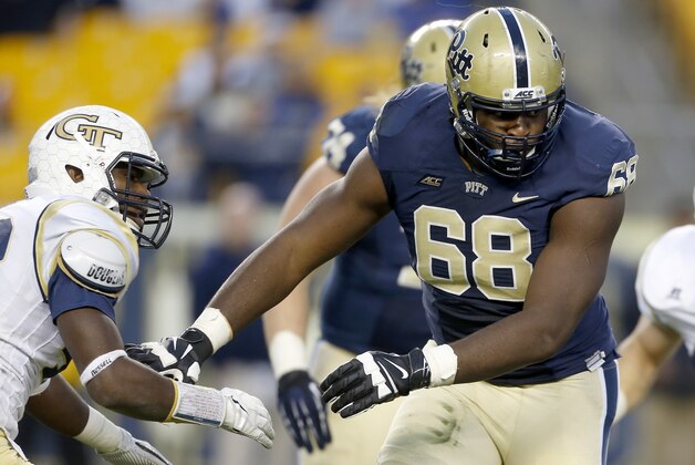 Pittsburgh offensive lineman T.J. Clemmings (68) plays in the fourth quarterof the NCAA football game against Georgia Tech, Saturday, Oct. 25, 2014, in Pittsburgh. (AP Photo/Keith Srakocic)