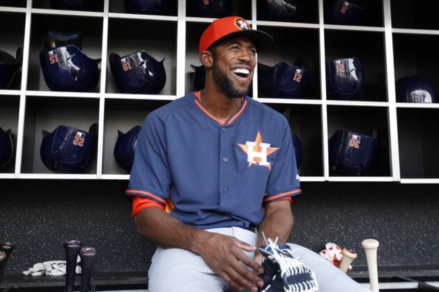 Houston Astros center fielder Dexter Fowler pauses before warming up before an interleague baseball game against the Washington Nationals at Nationals Park Wednesday, June 18, 2014, in Washington. (AP Photo/Alex Brandon)