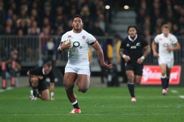 DUNEDIN, NEW ZEALAND - JUNE 14:  Manu Tuilagi of England breaks with the ball but is caught short of the try line by Ben Smith during the International Test Match between the New Zealand All Blacks and England at Forsyth Barr Stadium on June 14, 2014 in Dunedin, New Zealand.  (Photo by David Rogers/Getty Images)
