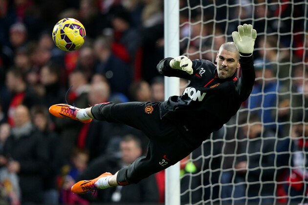 MANCHESTER, ENGLAND - JANUARY 11:  Victor Valdes of Manchester United takes part in the warm-up before the Barclays Premier League match between Manchester United and Southampton at Old Trafford on January 11, 2015 in Manchester, England.  (Photo by Clive Mason/Getty Images)