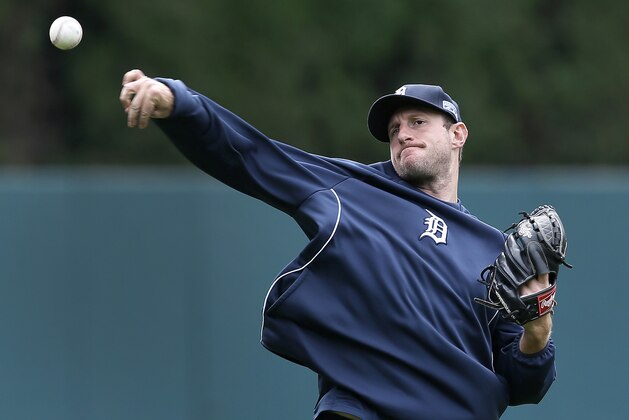 Detroit Tigers pitcher Max Scherzer throws during baseball practice in Detroit Tuesday, Sept. 30, 2014. The Detroit Tigers start the playoffs at the Baltimore Orioles in Game 1 of the American League Division Series Thursday. (AP Photo/Paul Sancya)