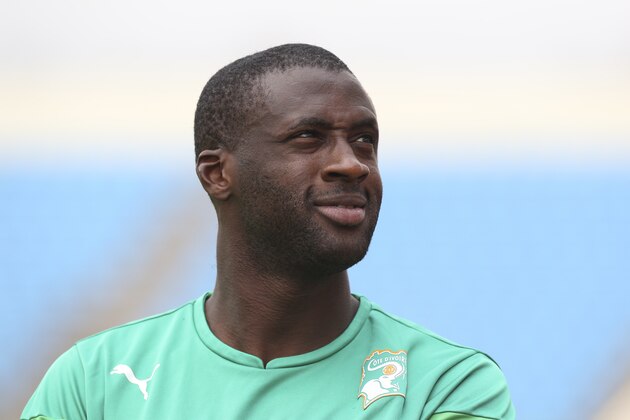 Ivory Coast soccer player, Yaya Toure, watches during a training session ahead of their Group D soccer match with Guinea at the Estadio De Malabu  in Malabo, Equatorial Guinea, Monday, Jan. 19, 2015.  (AP Photo/Sunday Alamba)