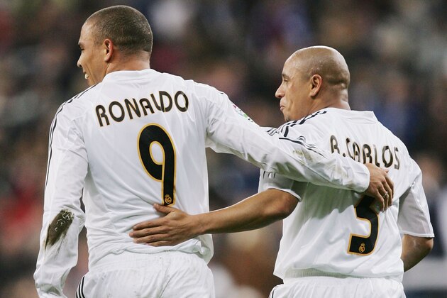 MADRID, SPAIN - DECEMBER 12: Ronaldo of Real Madrid celebrates with Roberto Carlos after scoring a goal against Real Sociedad during a Real Madrid v Real Sociedad Primera Liga match at the Bernabeu on December 12, 2004, in Madrid, Spain. (Photo by Denis Doyle/Getty Images)