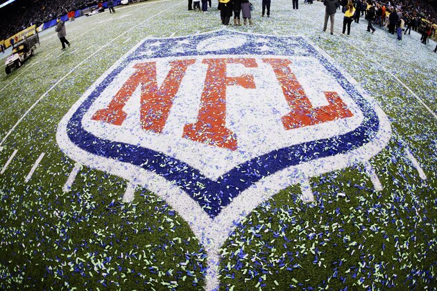 The field and NFL logo are covered with confetti after the NFL Super Bowl XLVIII football game between the Seattle Seahawks and the Denver Broncos Sunday, Feb. 2, 2014, in East Rutherford, N.J. The Seahawks won 43-8. (AP Photo/Mark Humphrey)