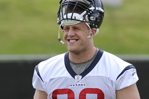 Houston Texans' J.J. Watt takes the field  during a voluntary veteran football mini-camp  Wednesday, May 7, 2014, in Houston. (AP Photo/Pat Sullivan)