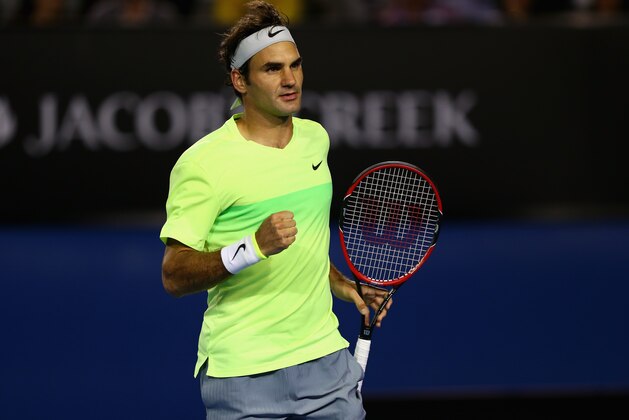 MELBOURNE, AUSTRALIA - JANUARY 19:  Roger Federer of Switzerland celebrates match point in his first round match against Yen-Hsun Lu of Chinese Taipei during day one of the 2015 Australian Open at Melbourne Park on January 19, 2015 in Melbourne, Australia.  (Photo by Clive Brunskill/Getty Images)