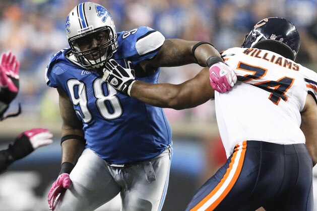 Detroit Lions defensive tackle Nick Fairley (98) tries to get by the block of Chicago Bears guard Chris Williams (74) in the fourth quarter an NFL football game in Detroit, Monday, Oct. 10, 2011. (AP Photo/Rick Osentoski)