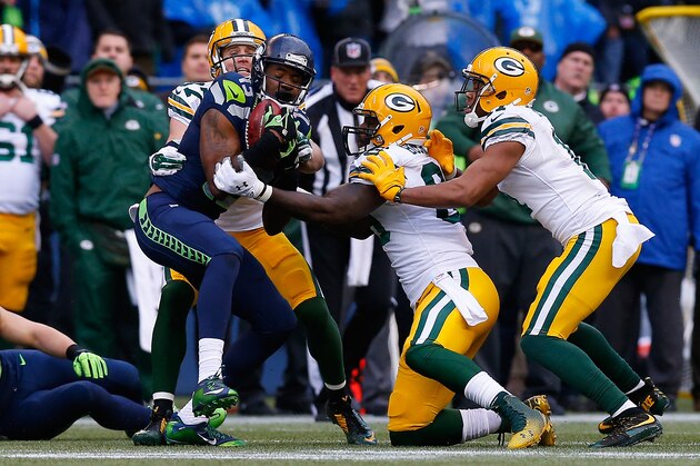 SEATTLE, WA - JANUARY 18: Chris Matthews #13 of the Seattle Seahawks grabs ahold of an onsides kick during the fourth quarter of the NFC Championship game against the Green Bay Packers  at CenturyLink Field on January 18, 2015 in Seattle, Washington.  (Photo by Tom Pennington/Getty Images)