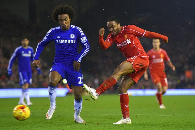 LIVERPOOL, ENGLAND - JANUARY 20:  Willian of Chelsea closes down Raheem Sterling of Liverpool during the Capital One Cup Semi-Final first leg match between Liverpool and Chelsea at Anfield on January 20, 2015 in Liverpool, England.  (Photo by Michael Regan/Getty Images)