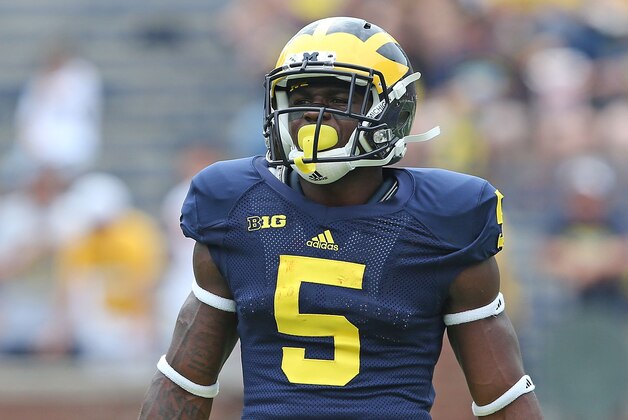 ANN ARBOR, MI - AUGUST 30:  Jabrill Peppers #5 of the Michigan Wolverines warms up prior to the start of the game against the Appalachian State Mountaineers on August 30, 2014 in Ann Arbor, Michigan. The Wolverines defeated the Mountaineers 52-14.  (Photo by Leon Halip/Getty Images)