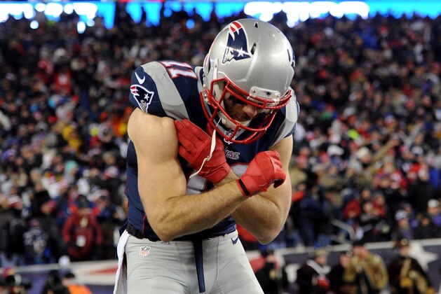FOXBORO, MA - JANUARY 10:  Julian Edelman #11 of the New England Patriots celebrates after throwing a touchdown pass in the third quarter against the Baltimore Ravens during the 2015 AFC Divisional Playoffs game at Gillette Stadium on January 10, 2015 in Foxboro, Massachusetts.  (Photo by Maddie Meyer/Getty Images)