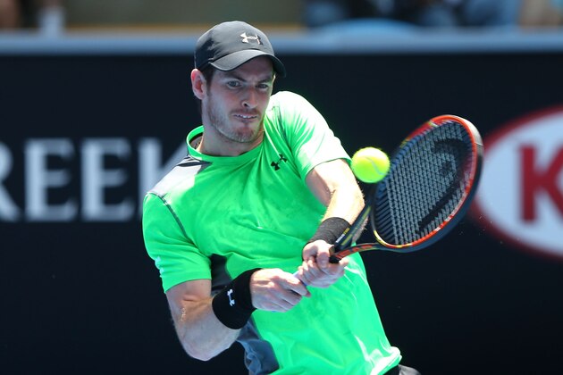 MELBOURNE, AUSTRALIA - JANUARY 21:  Andy Murray of Great Britain plays a backhand in his second round match against Marinko Matosevic of Australia during day three of the 2015 Australian Open at Melbourne Park on January 21, 2015 in Melbourne, Australia.  (Photo by Quinn Rooney/Getty Images)