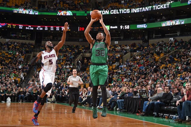 BOSTON, MA - JANUARY 14:  Marcus Smart #36 of the Boston Celtics shoots the ball against the Atlanta Hawks during the game on January 14, 2015 at the TD Garden in Boston, Massachusetts. NOTE TO USER: User expressly acknowledges and agrees that, by downloading and or using this Photograph, user is consenting to the terms and conditions of the Getty Images License Agreement. Mandatory Copyright Notice: Copyright 2015 NBAE (Photo by Brian Babineau /NBAE via Getty Images)