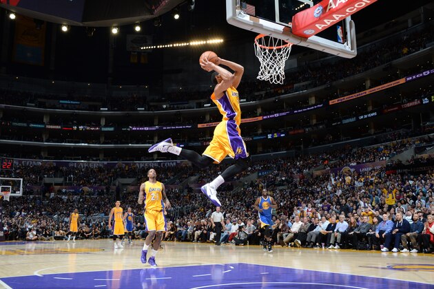 LOS ANGELES, CA - DECEMBER 23: Jordan Clarkson #6 of the Los Angeles Lakers dunks against the Golden State Warriors on December 23, 2014 at Staples Center in Los Angeles, California. NOTE TO USER: User expressly acknowledges and agrees that, by downloading and or using this Photograph, user is consenting to the terms and conditions of the Getty Images License Agreement. Mandatory Copyright Notice: Copyright 2014 NBAE (Photo by Andrew D. Bernstein/NBAE via Getty Images)