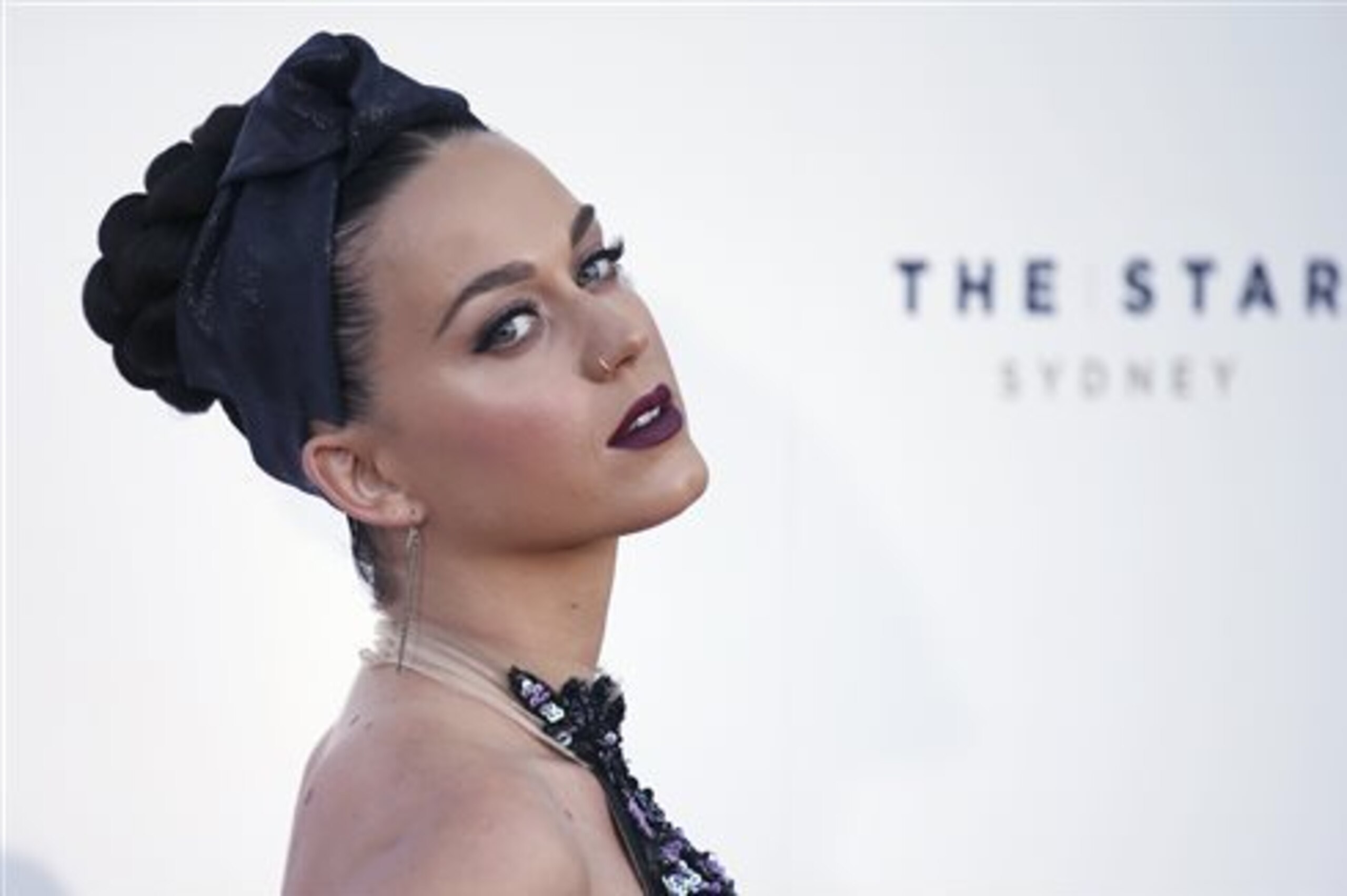FILE- In Nov. 26, 2014, file photo, pop star Katy Perry arrives for the Australian Recording Industry Association awards in Sydney. Perry said her female empowerment anthems make her the ideal Super Bowl halftime performer for the Sunday, Feb. 1, 2015. game in Glendale, Ariz. (AP Photo/Rick Rycroft, File)