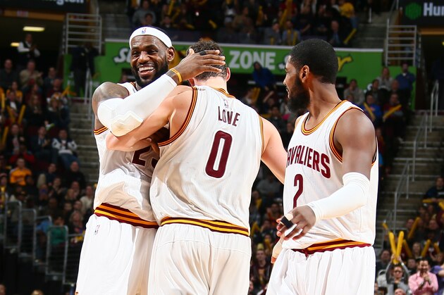 CLEVELAND, OH - DECEMBER 23: LeBron James #23, Kevin Love #0, and Kyrie Irving #2 of the Cleveland Cavaliers celebrate during a game against the Minnesota Timberwolves during the game on December 23, 2014 at Quicken Loans Arena in Cleveland, Ohio.  NOTE TO USER: User expressly acknowledges and agrees that, by downloading and or using this Photograph, user is consenting to the terms and conditions of the Getty Images License Agreement. Mandatory Copyright Notice: Copyright 2014 NBAE (Photo by Nathaniel S. Butler/NBAE via Getty Images)