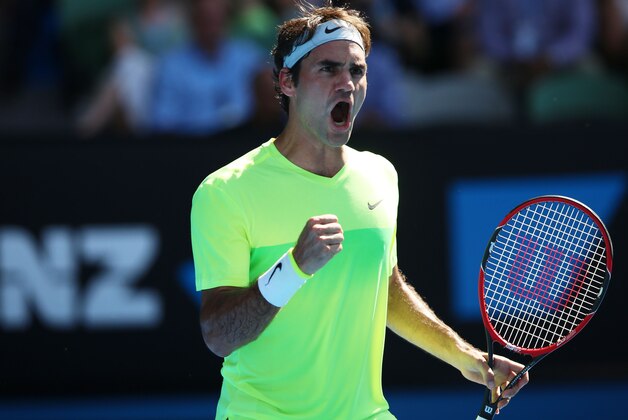 MELBOURNE, AUSTRALIA - JANUARY 21:  Roger Federer of Switzerland celebrates a point in his second round match against Simone Bolelli of Italy during day three of the 2015 Australian Open at Melbourne Park on January 21, 2015 in Melbourne, Australia.  (Photo by Hannah Peters/Getty Images)