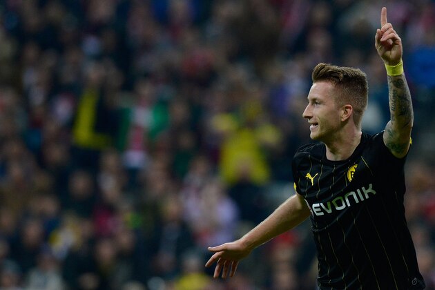 MUNICH, GERMANY - NOVEMBER 01:  Marco Reus of Dortmund celebrates his team's first goal during the Bundesliga match between FC Bayern Muenchen and Borussia Dortmund at Allianz Arena on November 1, 2014 in Munich, Germany.  (Photo by Daniel Kopatsch/Getty Images for MAN)