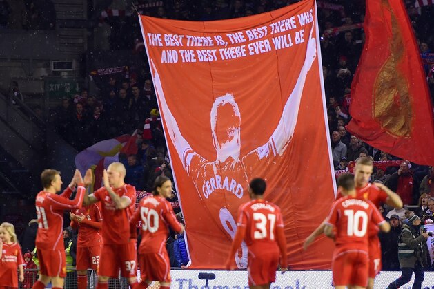 LIVERPOOL, ENGLAND - JANUARY 20:  Liverpool prepare to start the game as fans fly a flag for Captain Steven Gerrard of Liverpool during the Capital One Cup Semi-Final first leg match between Liverpool and Chelsea at Anfield on January 20, 2015 in Liverpool, England.  (Photo by Michael Regan/Getty Images)