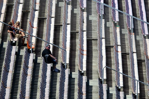 HOCKENHEIM, GERMANY - JULY 18:  Fans watch the action from a stand during practice ahead of the German Grand Prix at Hockenheimring on July 18, 2014 in Hockenheim, Germany.  (Photo by Mark Thompson/Getty Images)