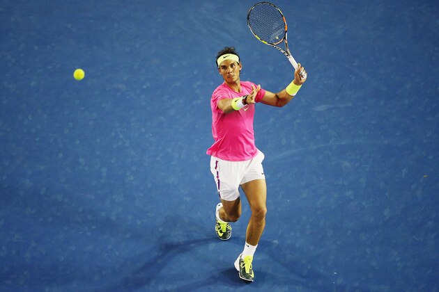 MELBOURNE, AUSTRALIA - JANUARY 21:  Rafael Nadal of Spain plays a volley in his second round match against Tim Smyczek of USA during day three of the 2015 Australian Open at Melbourne Park on January 21, 2015 in Melbourne, Australia.  (Photo by Hannah Peters/Getty Images)