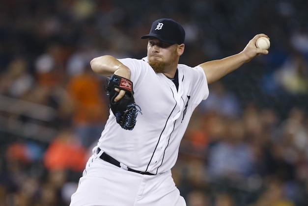 Sep 10, 2014; Detroit, MI, USA; Detroit Tigers relief pitcher Phil Coke (40) pitches in the eighth inning against the Kansas City Royals at Comerica Park. Mandatory Credit: Rick Osentoski-USA TODAY Sports