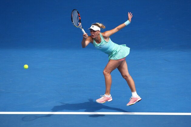 MELBOURNE, AUSTRALIA - JANUARY 20:  Caroline Wozniacki of Denmark plays a forehand in her first round match against Taylor Townsend of the United States during day two of the 2015 Australian Open at Melbourne Park on January 20, 2015 in Melbourne, Australia.  (Photo by Michael Dodge/Getty Images)