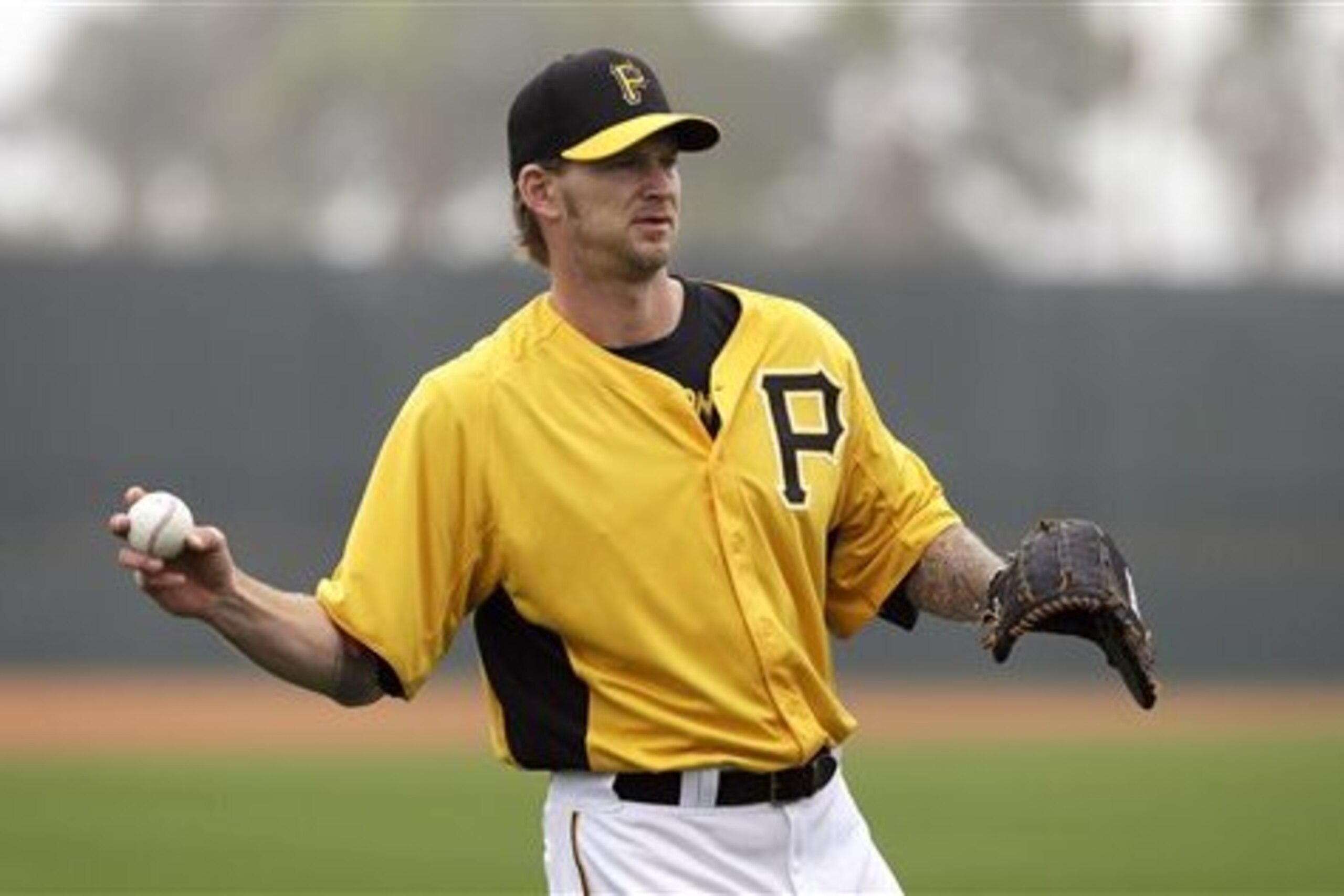 FILE - In this Feb. 13, 2013 file photo, Pittsburgh Pirates starting pitcher A.J. Burnett throws to a teammate during a baseball spring training workout in Bradenton, Fla. At 36, he's found a home with the Pittsburgh Pirates, where his leadership and swagger have turned him into the svengali of a young pitching staff eager to win. (AP Photo/Charlie Neibergall, File) FILE - In this Feb. 13, 2013 file photo, Pittsburgh Pirates starting pitcher A.J. Burnett throws to a teammate during a baseball spring training workout in Bradenton, Fla. At 36, he's found a home with the Pittsburgh Pirates, where his leadership and swagger have turned him into the svengali of a young pitching staff eager to win. (AP Photo/Charlie Neibergall, File)