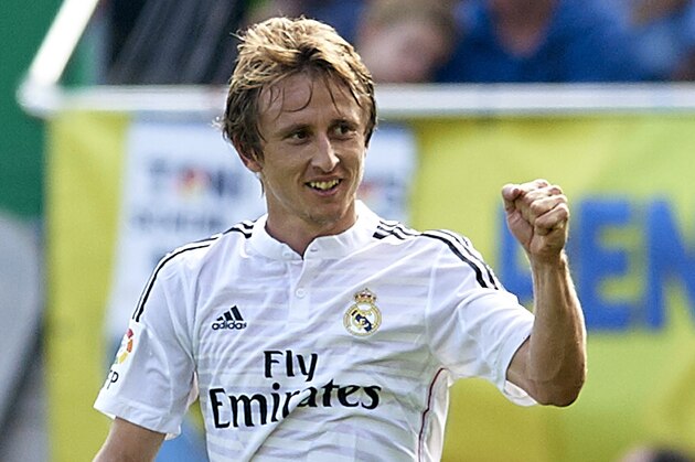 VILLARREAL, SPAIN - SEPTEMBER 27:  Luka Modric of Real Madrid celebrates after scoring during the La Liga match between Villarreal CF and Real Madrid at El Madrigal on September 27, 2014 in Villarreal, Spain.  (Photo by Manuel Queimadelos Alonso/Getty Images)