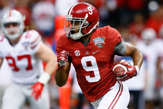 NEW ORLEANS, LA - JANUARY 01:  Amari Cooper #9 of the Alabama Crimson Tide runs the ball in the first quarter against the Ohio State Buckeyes during the All State Sugar Bowl at the Mercedes-Benz Superdome on January 1, 2015 in New Orleans, Louisiana.  (Photo by Kevin C. Cox/Getty Images)