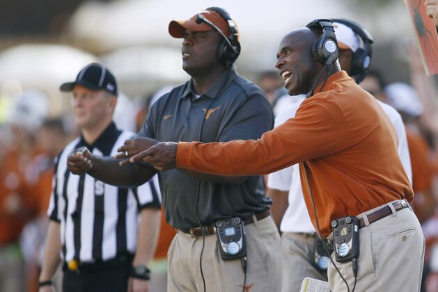 AUSTIN, TX - NOVEMBER 8: Head coach Charlie Strong of the Texas Longhorns calls out from the sideline during the NCAA Big 12 game against the Texas Longhorns on November 8, 2014 at Darrell K. Royal-Texas Memorial Stadium in Austin, Texas. Texas beat West Virginia 33-16. (Photo by Erich Schlegel/Getty Images)