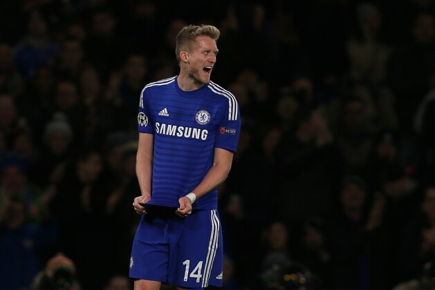 Chelsea’s Andre Schurrle celebrates scoring a goal during the Champions League Group G soccer match between Chelsea and Sporting Lisbon at Stamford Bridge in London, Wednesday, Dec. 10, 2014. (AP Photo/Tim Ireland)