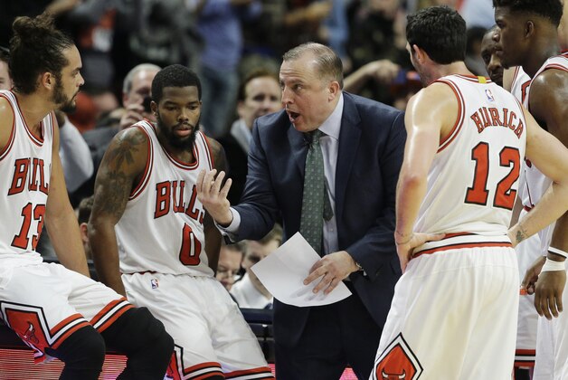 Chicago Bulls head coach Tom Thibodeau talks to his team during the second half of an NBA basketball game against the New York Knicks in Chicago on Thursday, Dec. 18, 2014. The Bulls won 103-97. (AP Photo/Nam Y. Huh)