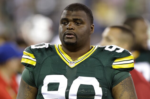 Green Bay Packers B.J. Raji walks off the field after the game against the Arizona Cardinals at the Lambeau Field in Green Bay Wis., Friday, August 09, 2013. (AP Photo/Mike McGinnis)