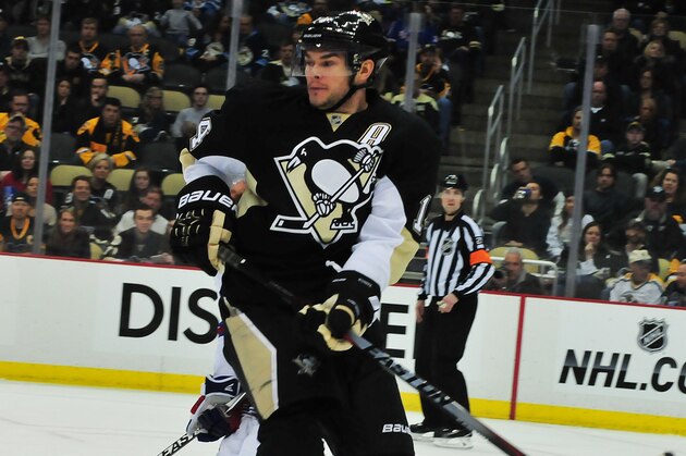 PITTSBURGH, PA - JANUARY 18: Kris Letang #58 of the Pittsburgh Penguins jumps to avoid the puck during a game against the New York Rangers at Consol Energy Center on January 18, 2015 in Pittsburgh, Pennsylvania. (Photo by Matt Kincaid/Getty Images)