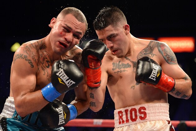 CARSON, CA - OCTOBER 13:  Brandon Rios punches Mike Alvarado on his way to a seventh round TKO win during the WBO Latino Super Lightweight Title fight at The Home Depot Center on October 13, 2012 in Carson, California.  (Photo by Harry How/Getty Images)
