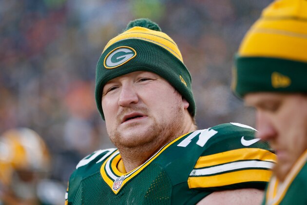 GREEN BAY, WI - NOVEMBER 30:  Tackle Bryan Bulaga #75 of the Green Bay Packers on the sidelines during the NFL game against the New England Patriots at Lambeau Field on November 30, 2014 in Green Bay, Wisconsin. The Packers defeated the Patriots 26-21.  (Photo by Christian Petersen/Getty Images)