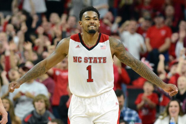 Nov 28, 2014; Raleigh, NC, USA; North Carolina State Wolfpack guard Trevor Lacey (1) reacts to making a late shot during the second half against the Boise State Broncos at PNC  Arena. The Wolfpack won 60-54.  Mandatory credit: Rob Kinnan-USA Today.