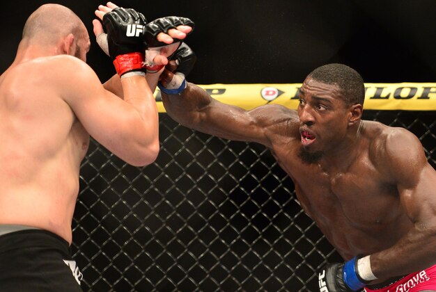 Oct 25, 2014; Rio de Janeiro, Brazil; Glover Teixeira (red gloves) fights Phil Davis (blue gloves) during UFC 179 at Ginasio do Maracanazinho. Mandatory Credit: Jason Silva-USA TODAY Sports