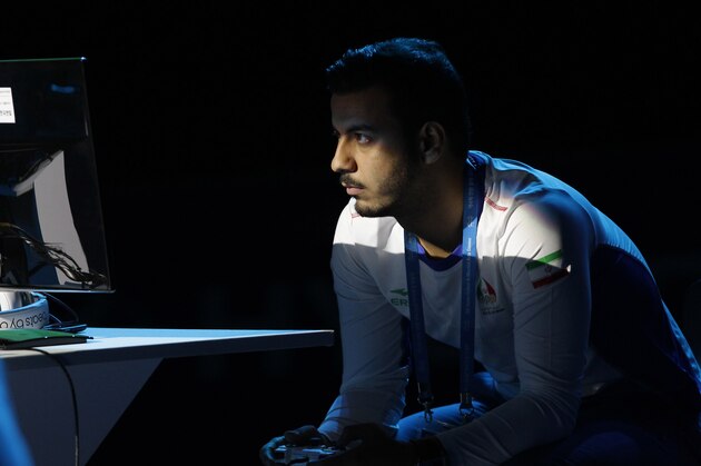 INCHEON, SOUTH KOREA - JULY 02:  Khoie Seyed Davoud of Iran competes in the e-Sports, FIFA 13 semi final against Chen Wei of China at Samsan World Gymnasium during day four of the 4th Asian Indoor Martial Arts Games on July 2, 2013 in Incheon, South Korea.  (Photo by Chung Sung-Jun/Getty Images)