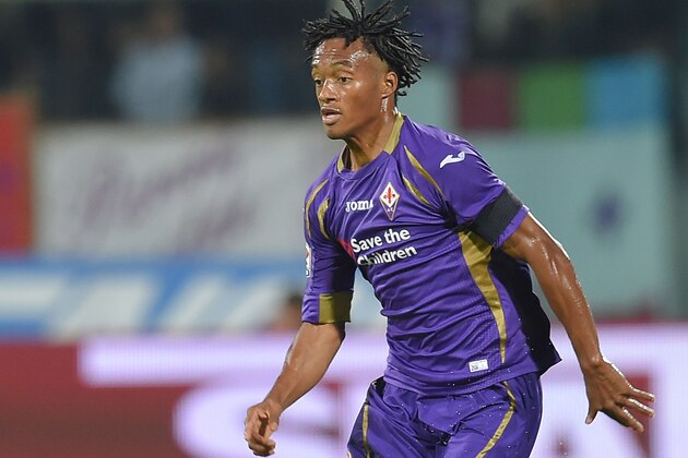 FLORENCE, ITALY - NOVEMBER 09:  Juan Cuadrado of Fiorentina in action during the Serie A match between ACF Fiorentina and SSC Napoli at Stadio Artemio Franchi on November 9, 2014 in Florence, Italy.  (Photo by Giuseppe Bellini/Getty Images)