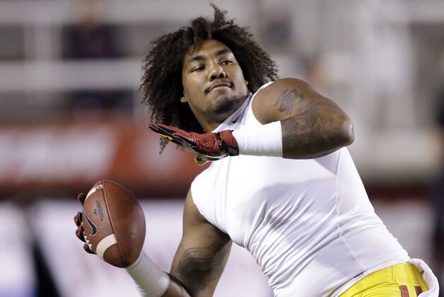 Southern California defensive end Leonard Williams warms up before the start of their NCAA college football game against Utah Saturday, Oct. 25, 2014, in Salt Lake City. (AP Photo/Rick Bowmer)