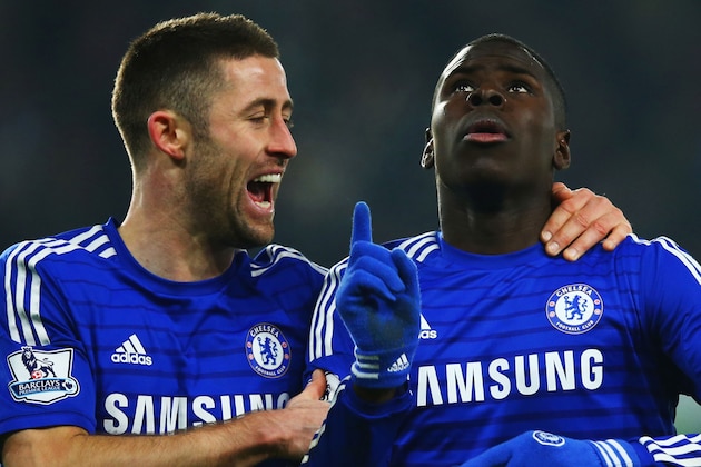 LONDON, ENGLAND - JANUARY 04:  Kurt Zouma of Chelsea (R) celebrates with Gary Cahill (L) as he scores their third goal during the FA Cup Third Round match between Chelsea and Watford at Stamford Bridge on January 4, 2015 in London, England.  (Photo by Richard Heathcote/Getty Images)